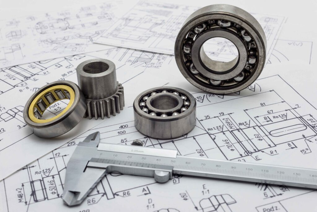 An image of technical drawings and bearings to associate with the enhanced JCP process and SPRS reporting.